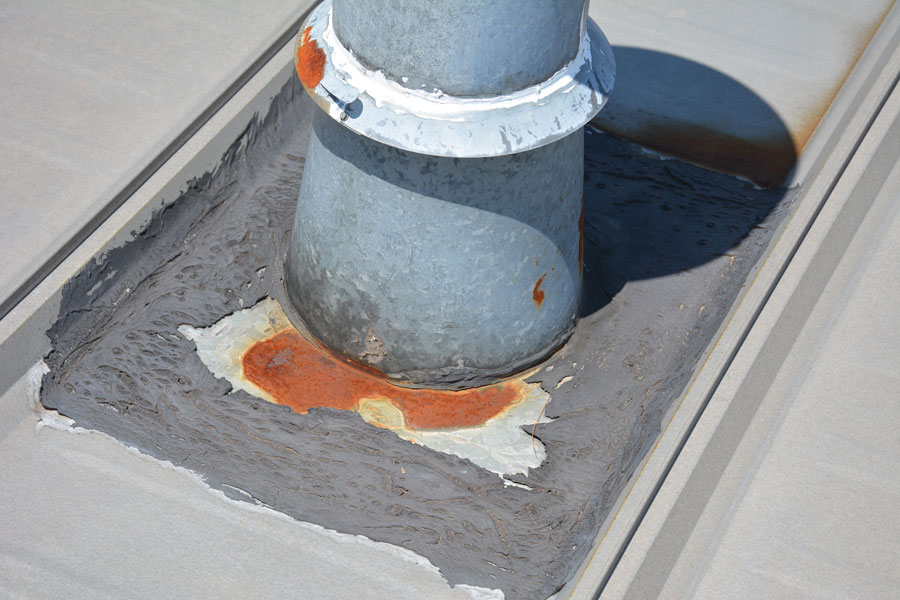 The flashing around this vent stack was tarred. The tar eventually dried and cracked.