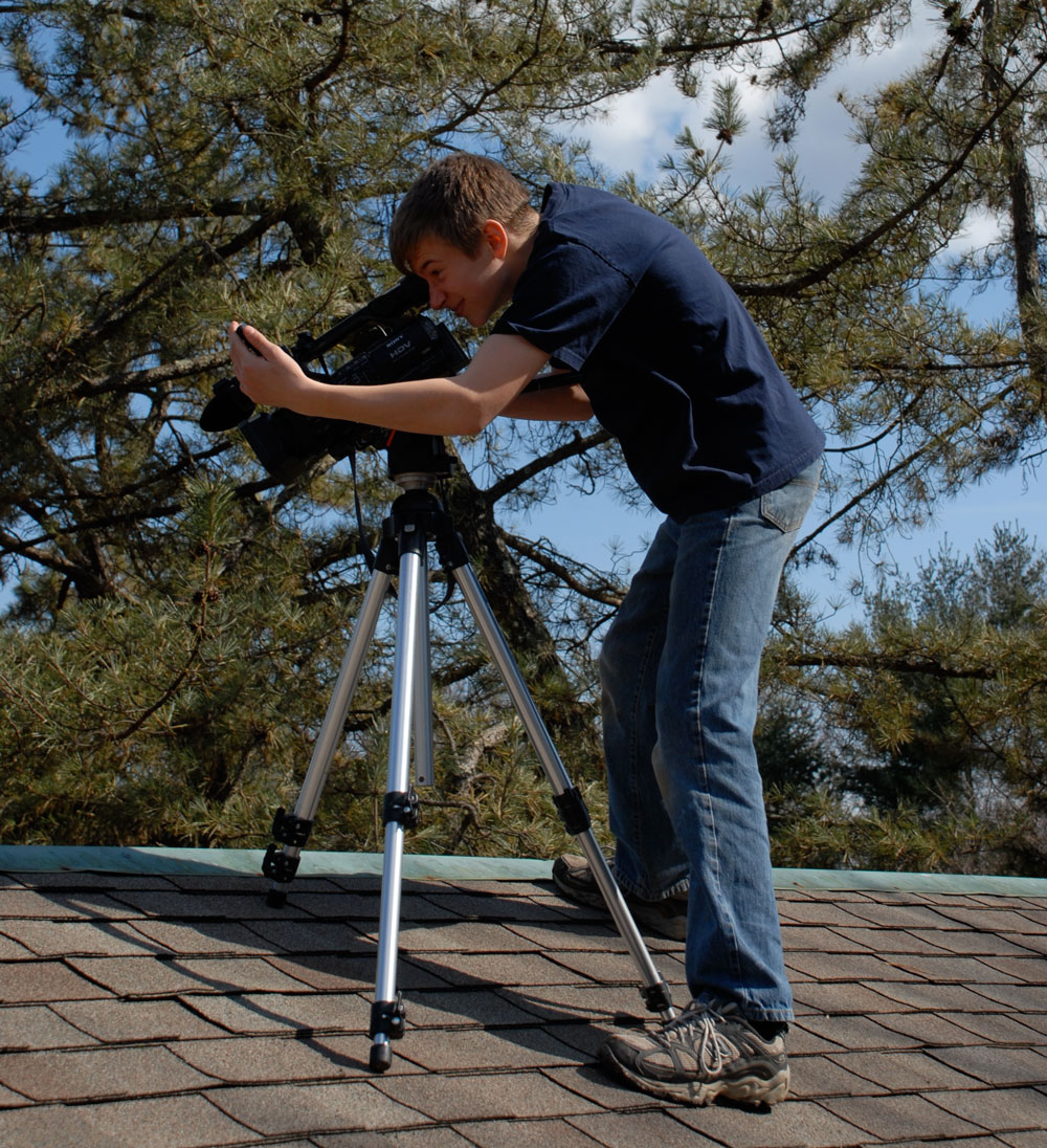 Sven on the camera taking videos of a flat roof