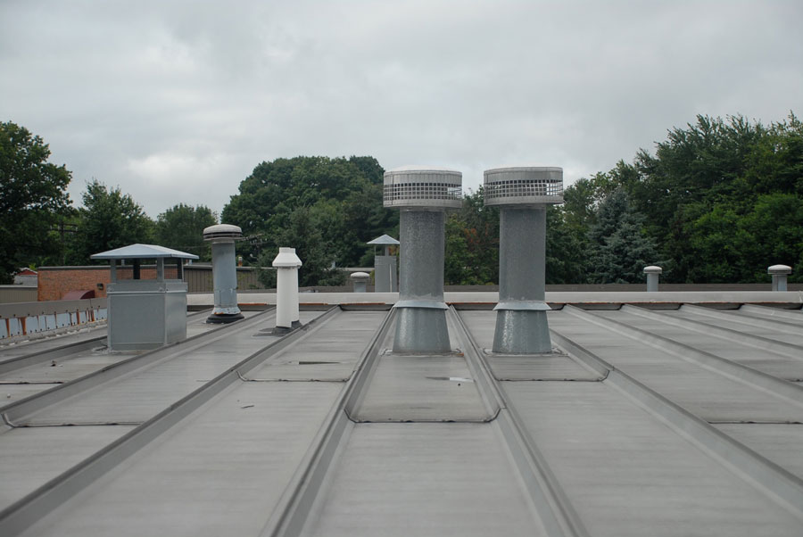 Metal roof recovery. We covered this entire metal roof with a rubber membrane.