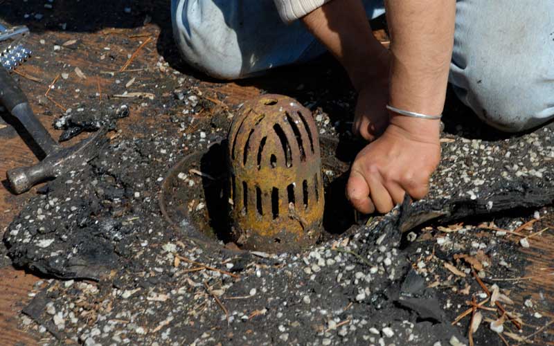 Old cast iron roof drain strainer