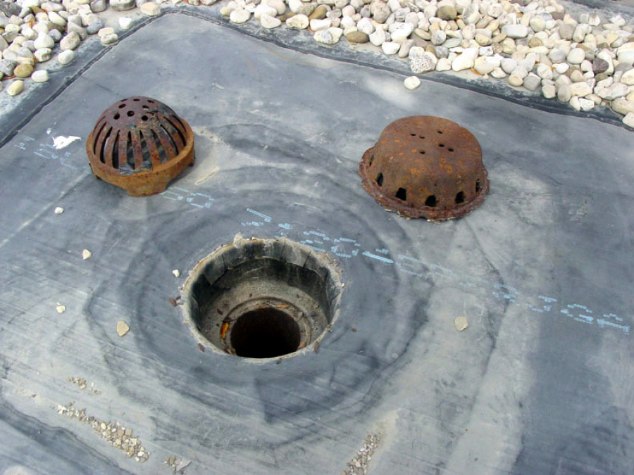 Cast Iron flat roof drain strainers were not a good design