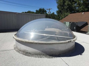 Dome Plexiglass skylight. These are good for flat roofs because water and snow will not accumulate on top of them