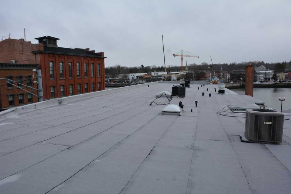 Roofing Contractor Completed roof over Tar and Gravel Commercial Roofing Contractors