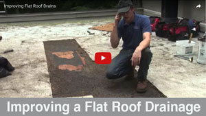 Improving-drainage-for-a-flat-roof by lowering the drain Watch video