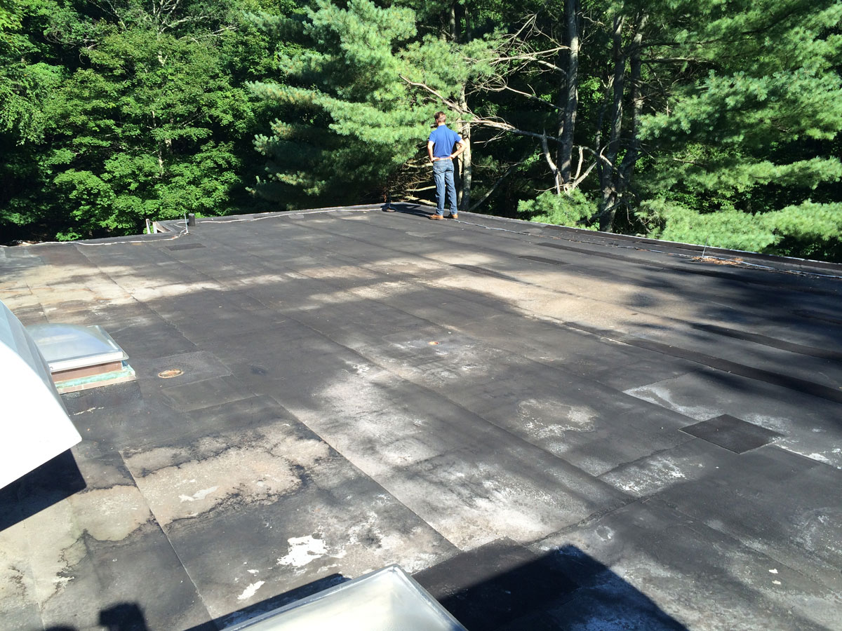 A modified Bitumen Torch Down Rubber Roof ready for a new layer. A modified Bitumen Torch Down Rubber Roof ready for a new layer.